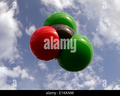 La struttura molecolare del fosgene che mostra il carbonio (nero) di cloro (verde) e ossigeno (rosso) computer grafica. Foto Stock