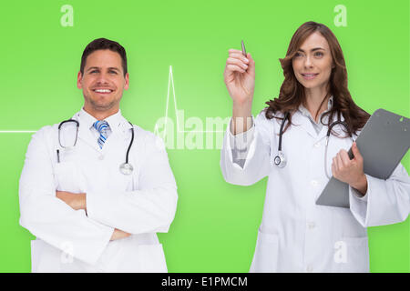 Immagine composita di felice team medico Foto Stock