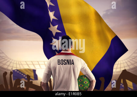 Immagine composita della Bosnia football giocatore in possesso palla Foto Stock