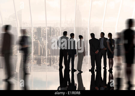 Immagine composita di colleghi di lavoro in piedi Foto Stock