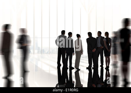 Immagine composita di colleghi di lavoro in piedi Foto Stock