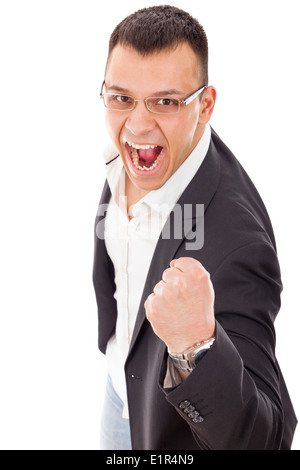 Successo imprenditore giovane clenching pugno nel divertimento Foto Stock