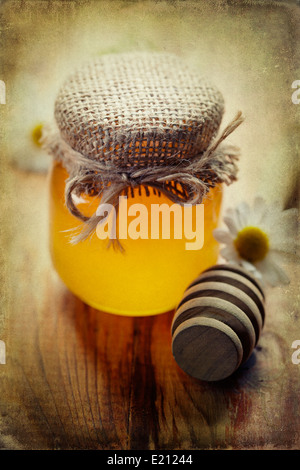 Full honey pot e miele stick Foto Stock