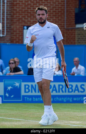 Londra, Regno Unito. 12 Giugno, 2014. Stan Wawrinka della Svizzera celebra dopo aver vinto un punto contro Sam QUERREY degli Stati Uniti durante gli uomini corrispondono a Aegon i campionati di tennis torneo tenutasi presso il Queens Club. Credit: Azione Plus immagini di sport/Alamy Live News Foto Stock