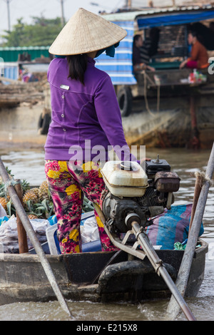 Il Delta del Mekong è un acquoso paesaggio di campi verdi e villaggi assonnato, i suoi abitanti cordiale e accogliente per i turisti. Foto Stock