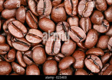 Gruppo di chicchi di caffè formando uno sfondo Foto Stock