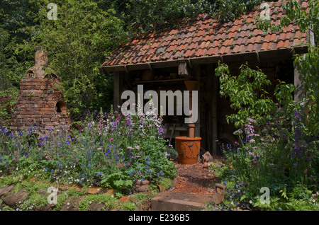 Il DialAFlight Potter's Garden al RHS Chelsea Flower Show. Foto Stock