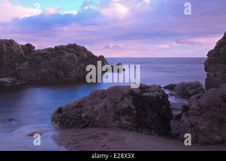 Tramonto sulla baia di Morecambe, da argento dale shore. mappa REF 445 761. Foto Stock