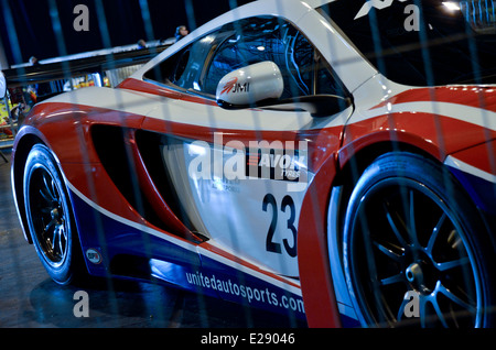 McLaren MP4-12C Gt auto dietro a gabbia Foto Stock