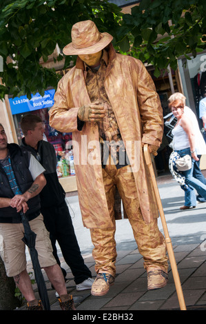 Un esecutore di strada su Buchannan Street in Glasgow Scotland Regno Unito Foto Stock