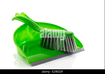 Il verde della paletta e spazzola isolato su bianco Foto Stock