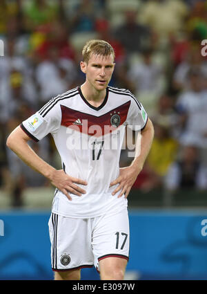 Fortaleza Brasile. Il 21 giugno, 2014. La Germania Per Mertesacker reagisce durante la Coppa del Mondo FIFA 2014 Gruppo G turno preliminare match tra Germania e Ghana al Estadio Castelao Stadium di Fortaleza, Brasile, 21 giugno 2014. Foto: Andreas Gebert/dpa/Alamy Live News Foto Stock