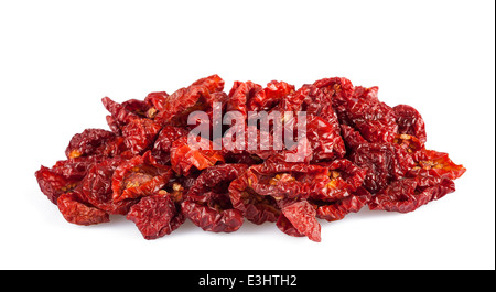 Pomodori secchi isolati su sfondo bianco. Foto Stock