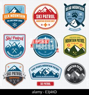 Set di ski patrol badge di montagna e patch Illustrazione Vettoriale
