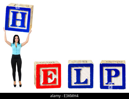Donna sollevare lettera dalla parola help Foto Stock