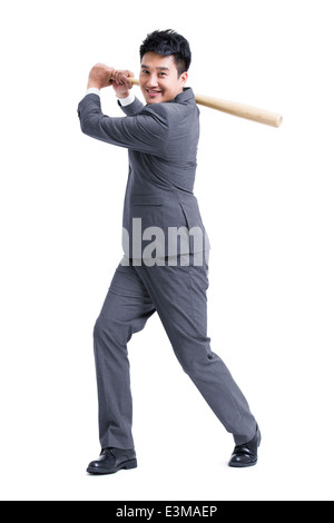 Imprenditore a giocare a baseball Foto Stock