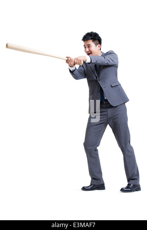 Imprenditore a giocare a baseball Foto Stock