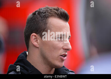 Spielberg, Austria. Il 21 giugno, 2014. Austriaco ex driver di Formula Uno Christian Klien ha una chat nel paddock di Red Bull Ring race track in Spielberg, Austria, 21 giugno 2014. Il 2014 FORMULA ONE Grand Prix dell'Austria avrà luogo il 22 giugno. Foto: David Ebener/dpa - nessun filo SERVICE -/dpa/Alamy Live News Foto Stock