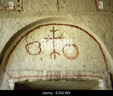 La Turchia. Goreme National Park. Chiesa troglodita. Dettaglio di un dipinto all'ingresso. Antatolia centrale. Foto Stock