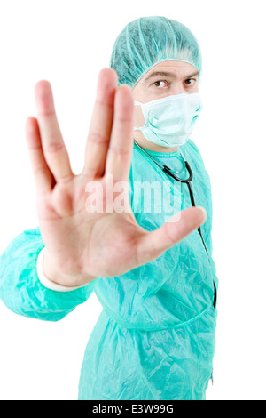 Giovane maschio medico andando arrestare con la sua mano, isolato Foto Stock