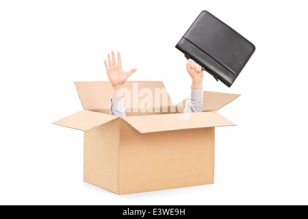 Uomo che allunga la mano al di fuori di un box Foto Stock