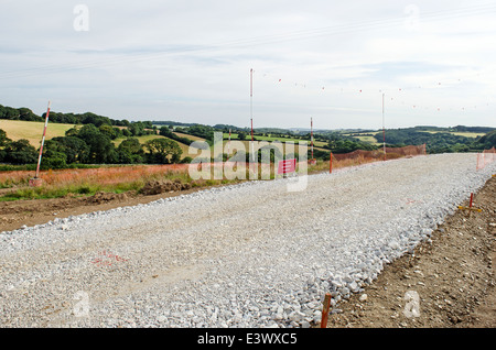 Una nuova strada in costruzione per un fuori città lo sviluppo in truro, Cornwall, Regno Unito Foto Stock