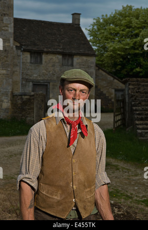 Ritratto di coppia agricoltore tradizionale nel cortile Foto Stock