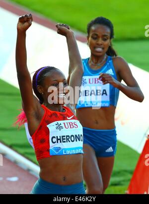 Losanna, Svizzera. 3 Luglio, 2014. In Kenya la misericordia Chernon celebra dopo la donna 3000m gara durante la IAAF Diamond League riunioni di Losanna, Svizzera, 3 luglio 2014. La misericordia Chernon rivendicato il titolo dell'evento in 8 minuti e secondi 50.24. Credito: Gong Bing/Xinhua/Alamy Live News Foto Stock