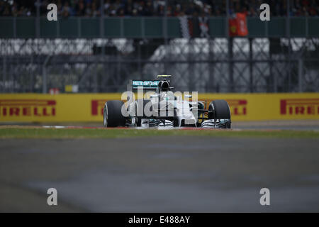 Towcester, Regno Unito. 5 Luglio, 2014. NICO ROSBERG della Germania e la Mercedes AMG Petronas F1 unità di squadra durante la sessione di qualifiche della Formula 1 Gran Premio di Gran Bretagna 2014 sul circuito di Silverstone a Towcester, Regno Unito. Credito: James Gasperotti/ZUMA filo/Alamy Live News Foto Stock