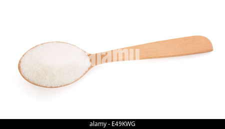 Lo zucchero e il cucchiaio isolati su sfondo bianco Foto Stock