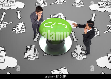 Immagine composita di pensosa asian businessman rivolta Foto Stock