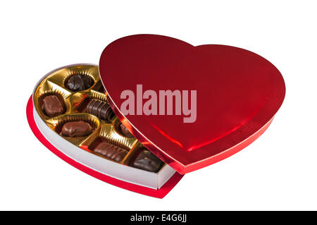 Il giorno di San Valentino dono di oro a forma di cuore ad una scatola di  cioccolatini appoggiata sulla scatola cuore top dando un doppio effetto di  cuore Foto stock - Alamy