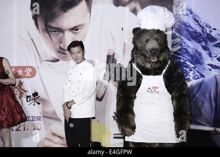 Pechino, Cina. 9 Luglio, 2014. Cantante e attore Nicholas Tse assiste il premier del reality show "Chef" Nic a Pechino in Cina mercoledì 9 luglio 2014. © TopPhoto/Alamy Live News Foto Stock