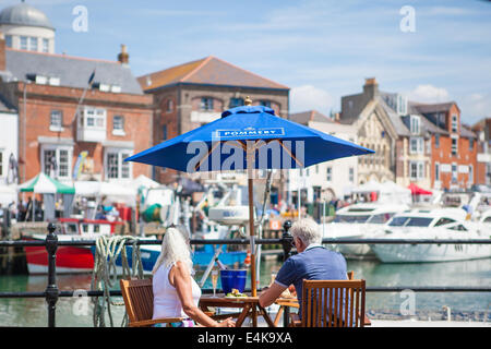 Street view presso Dorset festival di frutti di mare. Weymouth, Dorset Regno Unito Foto Stock