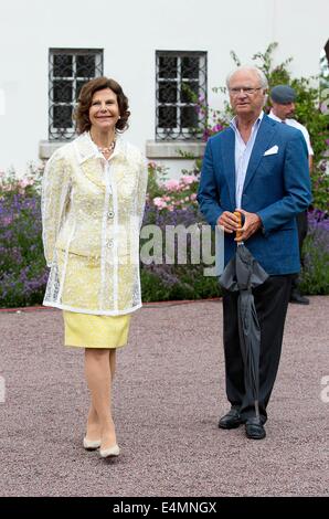 Solliden, 14-07-2014 Re Carlo Gustavo e la Regina Silvia trentasettesimo compleanno della Principessa Ereditaria Vittoria di Svezia presso il castello di Solliden RPE/Albert Nieboer// /dpa - NESSUN SERVIZIO DI FILO- /dpa - Nessun servizio di filo- Foto Stock