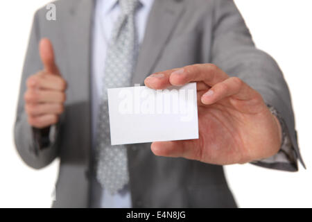 Executive con un fustellato businesscard Foto Stock