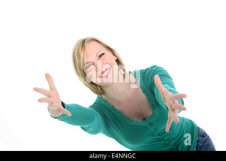 Donna sorridente con le braccia tese Foto Stock