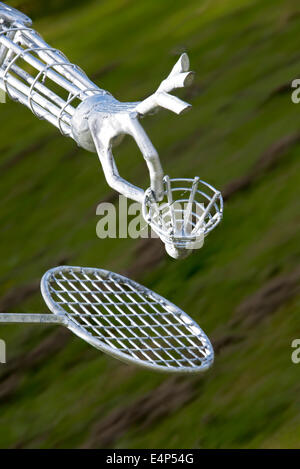 Dettagli dalla scultura di Badminton Player per giochi del Commonwealth Glasgow 2014. Sfocatura dello sfondo. Foto Stock
