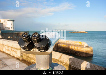 A gettone affacciato sul telescopio Foto Stock