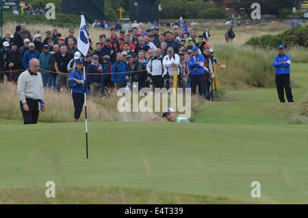 Royal Liverpool Golf Club, Hoylake, UK. 16 Luglio, 2014. Il finale aperto giorno di pratica. Ross Fisher nel bunker durante la sua pratica rotonda. Credito: rsdphotography/Alamy Live News Foto Stock