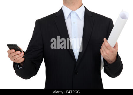 Manager in possesso di una carta Foto Stock