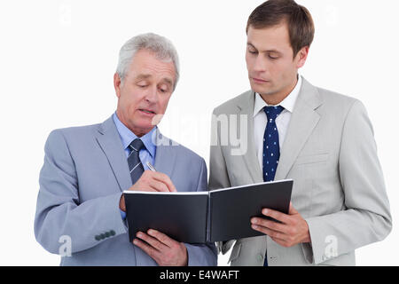 Commercianti prendendo appunti Foto Stock