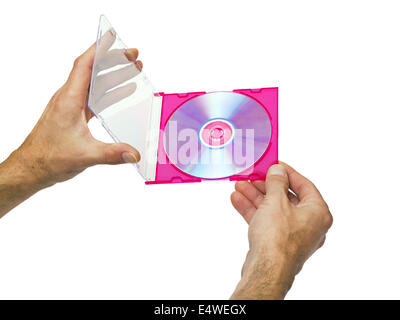 Aprire la scatola con un DVD nelle mani di maschio Foto Stock