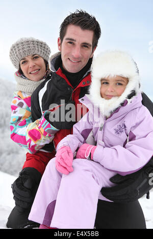 Famiglia nella neve Foto Stock