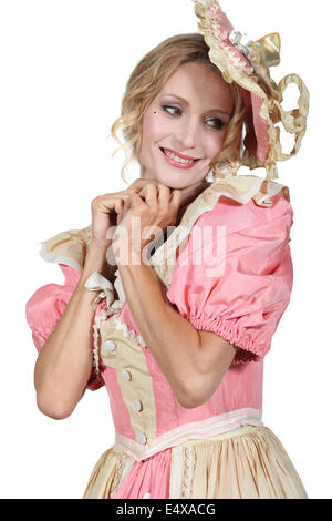 La donna in un costume rosa Foto Stock