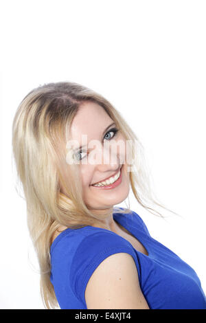 Ritratto di un sorridente giovane donna Foto Stock