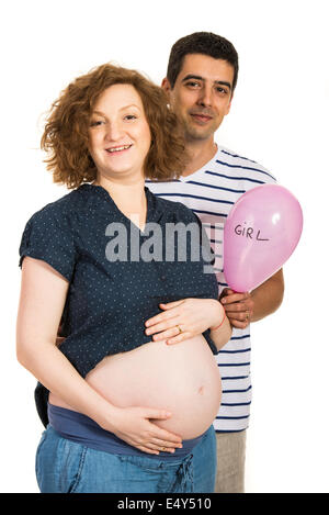 Futura Mamma e papà holding palloncino rosa con messaggio ragazza isolato su sfondo bianco Foto Stock