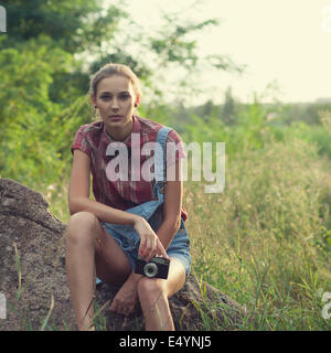 Hipster ragazza in posa Foto Stock