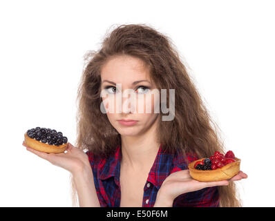 Scelta difficile tra due torte Foto Stock