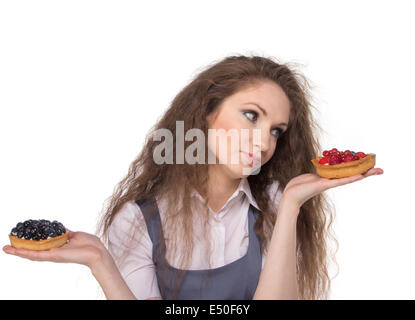 Scelta difficile tra due torte Foto Stock